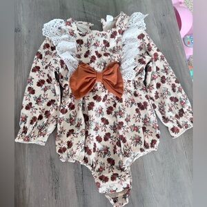 Floral One Piece with Orange Bow